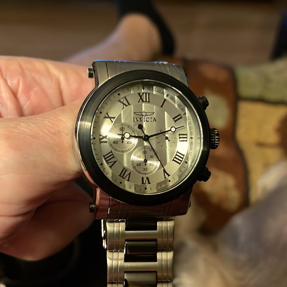 Up for sale is nine watches, including Invicta sterling cardinal